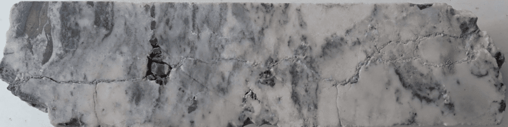 Figure 5: KAS-01 at 376.3 meters downhole as an example of intense alteration (Quartz-Sericite-Pyrite). 
